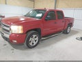 2009 Chevrolet Silverado 1500 — photo 2 of 16 | VIN 3GCEK233X9G256396