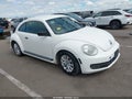 2013 Volkswagen Beetle — photo 1 of 16 | VIN 3VWFP7AT8DM654851