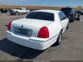 2003 Lincoln Town Car — photo 4 of 16 | VIN 1LNHM82W63Y605617