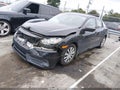 2016 Honda Civic — photo 2 of 17 | VIN 19XFC2F53GE089709