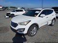 2013 Hyundai Santa Fe — photo 2 of 17 | VIN 5XYZU3LA2DG072674