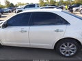 2011 Lincoln MKZ — photo 14 of 16 | VIN 3LNHL2GC8BR764392