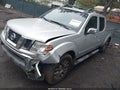 2009 Nissan Frontier — photo 2 of 16 | VIN 1N6AD09W09C414243