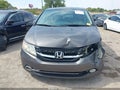 2016 Honda Odyssey — photo 12 of 16 | VIN 5FNRL5H94GB043931