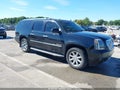 2009 GMC Yukon XL — photo 1 of 11 | VIN 1GKFK06239R301145