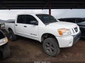 2010 Nissan Titan — photo 13 of 16 | VIN 1N6BA0EC6AN300068