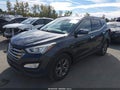 2015 Hyundai Santa Fe — photo 2 of 16 | VIN 5XYZUDLB8FG259144