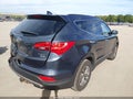 2015 Hyundai Santa Fe — photo 4 of 16 | VIN 5XYZUDLB8FG259144