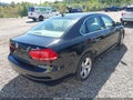 2013 Volkswagen Passat — photo 4 of 11 | VIN 1VWBP7A34DC047037