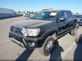 2014 Toyota Tacoma — photo 2 of 19 | VIN 3TMJU4GN5EM160946