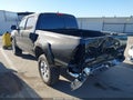2014 Toyota Tacoma — photo 3 of 19 | VIN 3TMJU4GN5EM160946