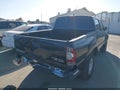 2014 Toyota Tacoma — photo 4 of 19 | VIN 3TMJU4GN5EM160946