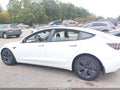 2023 Tesla Model 3 — photo 15 of 19 | VIN 5YJ3E1EA3PF512319