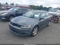 2014 Volkswagen Jetta — photo 2 of 11 | VIN 3VWLL7AJ6EM404328