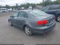 2014 Volkswagen Jetta — photo 3 of 11 | VIN 3VWLL7AJ6EM404328