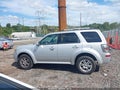 2009 Mercury Mariner — photo 14 of 16 | VIN 4M2CU87G49KJ25811