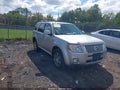 2009 Mercury Mariner — photo 1 of 16 | VIN 4M2CU87G49KJ25811