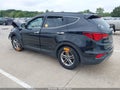 2017 Hyundai Santa Fe — photo 3 of 16 | VIN 5NMZUDLB6HH028574