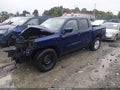 2022 Nissan Frontier — photo 2 of 16 | VIN 1N6ED1EKXNN677610