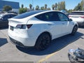 2023 Tesla Model Y — photo 4 of 19 | VIN 7SAYGDEE8PF676155