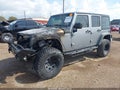 2016 Jeep Wrangler Unlimited — photo 2 of 11 | VIN 1C4BJWDG2GL178243