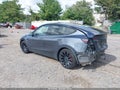 2022 Tesla Model Y — photo 3 of 18 | VIN 7SAYGDEF2NF465832