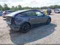 2022 Tesla Model Y — photo 4 of 18 | VIN 7SAYGDEF2NF465832