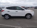 2013 Hyundai Tucson — photo 13 of 17 | VIN KM8JT3AB2DU755478