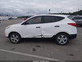 2013 Hyundai Tucson — photo 14 of 17 | VIN KM8JT3AB2DU755478