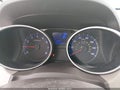 2013 Hyundai Tucson — photo 7 of 17 | VIN KM8JT3AB2DU755478