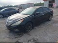 2011 Hyundai Sonata — photo 2 of 16 | VIN 5NPEC4AC0BH143999