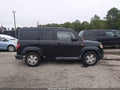 2010 Honda Element — photo 13 of 16 | VIN 5J6YH2H31AL001819