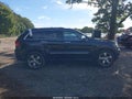 2012 Jeep Grand Cherokee — photo 13 of 16 | VIN 1C4RJFCT5CC161380