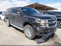 2015 Chevrolet Suburban 1500 — photo 1 of 17 | VIN 1GNSCJKC4FR264735