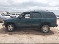 2001 Chevrolet Tahoe — photo 13 of 15 | VIN 1GNEC13T01J310404