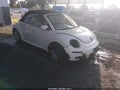 2009 Volkswagen Beetle — photo 1 of 18 | VIN 3VWRF31YX9M401476