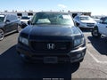 2013 Honda Ridgeline — photo 12 of 17 | VIN 5FPYK1F76DB001885