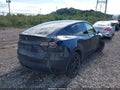 2025 Tesla Modelo Y — photo 4 of 17 | VIN 7SAYGDEE2SF284538