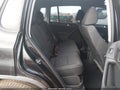 2014 Volkswagen Tiguan — photo 8 of 11 | VIN WVGAV3AX4EW510404