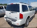 2014 Nissan Armada — photo 4 of 16 | VIN 5N1BA0ND6EN604725