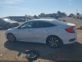 2019 Honda Civic — photo 14 of 16 | VIN 2HGFC2F61KH554060