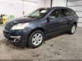 2013 Chevrolet Traverse — photo 2 of 14 | VIN 1GNKVGKD2DJ167969