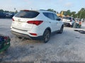 2017 Hyundai Santa Fe — photo 4 of 16 | VIN 5XYZU3LB0HG435701