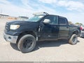 2011 Toyota Tundra — photo 13 of 15 | VIN 5TFDW5F16BX163887
