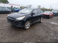 2011 Hyundai Tucson — photo 2 of 11 | VIN KM8JUCAC6BU309434