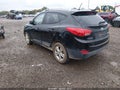 2011 Hyundai Tucson — photo 3 of 11 | VIN KM8JUCAC6BU309434