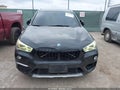2017 BMW X1 — photo 12 of 18 | VIN WBXHU7C37H5H35925