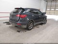 2016 Hyundai Santa Fe — photo 4 of 17 | VIN 5XYZU3LB3GG333808