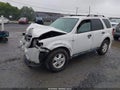 2012 Ford Escape — photo 2 of 11 | VIN 1FMCU9D74CKC29735