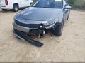 2016 Kia Optima — photo 6 of 11 | VIN 5XXGU4L35GG058114